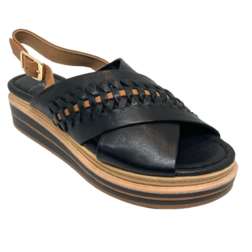 Django & Juliette are renown for their great flatforms and this style is no different. In a very useful colour combination of black with tan this little sandal with it's wide crossover front will look good with pants, shorts or dresses this summer. Being flat but having height is certainly a plus.  Leather upper and lining.