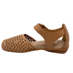 A flat, slightly wedged, comfort sandal with a heel cup, velcroed strap across the instep and a soft woven front with a small peep toe. Definitely designed for to keep feet happy. Great neutral tan leather.