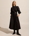The Edition is the perfect afternoon to evening dress for the season. The panelled and seamed sleeves are top- stitched and provide beautiful detail on this elegant yet effortless piece. A covered placket and drop waist offer a clean minimal finish.  Team yours with a knee-high boot for an elevated aesthetic.   
