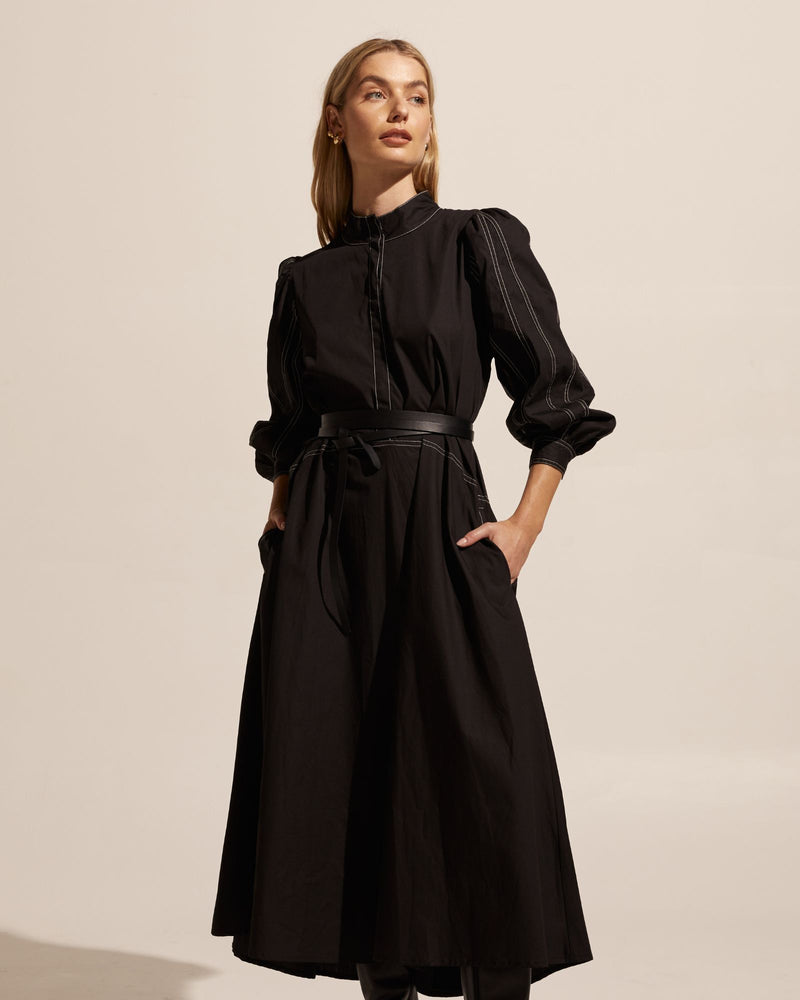The Edition is the perfect afternoon to evening dress for the season. The panelled and seamed sleeves are top- stitched and provide beautiful detail on this elegant yet effortless piece. A covered placket and drop waist offer a clean minimal finish.  Team yours with a knee-high boot for an elevated aesthetic.   