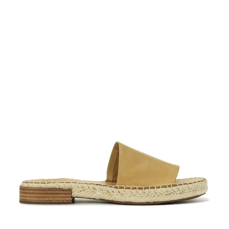 A great little soft leather flat slide with a rope sole but with a quirky little veneer heel as well. Soft and easy for summer.