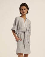 The evoke embraces a sense of ease that is perfect for both adventure and unwinding. A wide boxy sleeve balances a simple kaftan silhouette that can be worn with or without the matching belt. Organic inspired embroidery finishes this garment beautifully.      above the knee dress self-tie matching belt floral embroidered details