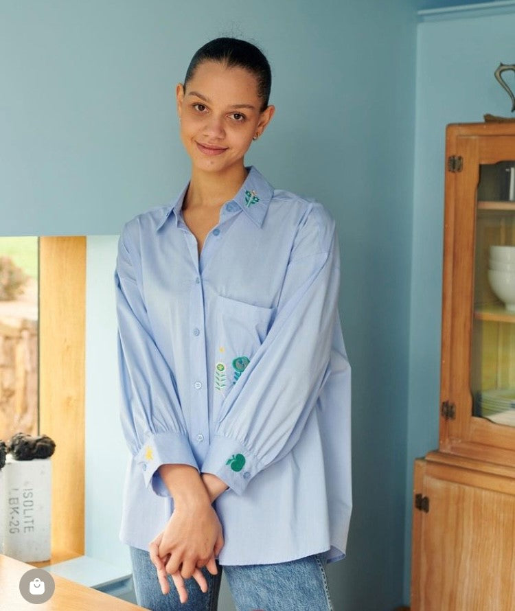 This versatile, relaxed fit, classic shirt is crafted from our breathable light weight cotton. Dropped shoulders, slightly gathered cuffs, chest patch pocket and garden emboidery of "bees", "flowers", "watering can" and "love" placed throughout gives it  the life and colour of Spring. Wear solo as a shirt dress or throw over you favourite denim and white tee.  Composition:  Cotton/elastane