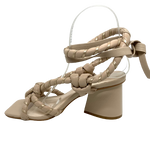 How cool are these heels from Hael & Jax! The tear drop shaped heel is both stable and stylish at 8cm high. The square toe works well with the tubular, soft, nude coloured, leather straps. These straps are in turn bound in pale gold. The chunky knots give support. Ankle ties finish off these unique sandals.