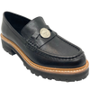 This gorgeous chunky black leather loafer from Django & Juliette is a comfortable fit, has a black "tractor"sole, tan rand and is finished with a silver "coin" trim.
