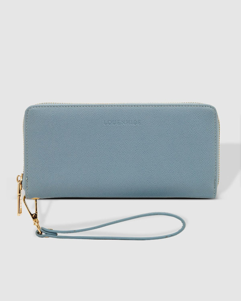 The Louenhide Jessica wallet is a classic and elegant carryall that is a customer favourite season after season. Sleek and compact with plenty of storage for cards, notes, and coins, the Jessica is perfect for everyday use. Slip easily over your wrist with its detachable wristlet for a clutch option on a night out!