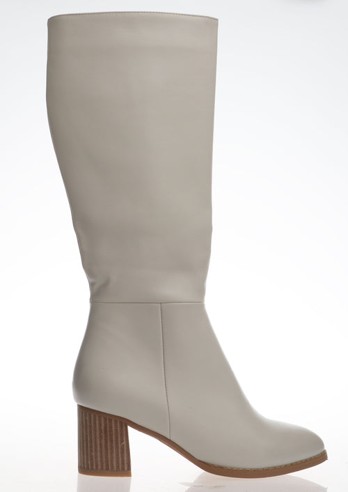 These gorgeous boots are made from vegan (man made) leather and look fabulous in this bone colour. They have and inside zip, elastic gusset at the top and a comfortable 6.5cm heel.