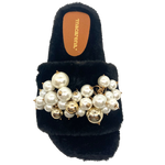A super soft and comfy slide that is also glamorous and fun! With a moulded sole unit that fits the contours of the foot these furry slides are trimmed with a huge cluster of pearls. But don't just keep them for the bedroom wear them with your favourite jeans when you're out and about. Available black. Made in Spain.