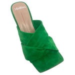 This fabulous colour of emerald green is styled in the perfect shoe. The soft suede used in the wide straps across the foot offers comfort and support while the square toe and squared off hour glass shaped heel add the perfect amount of "quirky". These slides will add spark to the dullest of outfits and can be worn with pants, skirts, denim, racewear and evening wear. A great addition to any wardrobe.