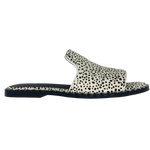 Suede pony hide slides in white with tiny black spots