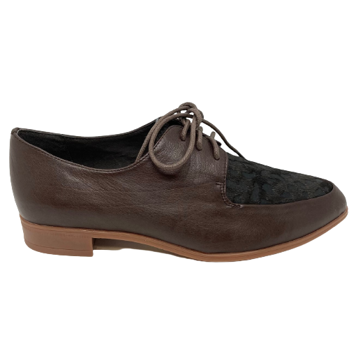 Leather lace-ups with spotted pony hide on the toe in chocolate brown