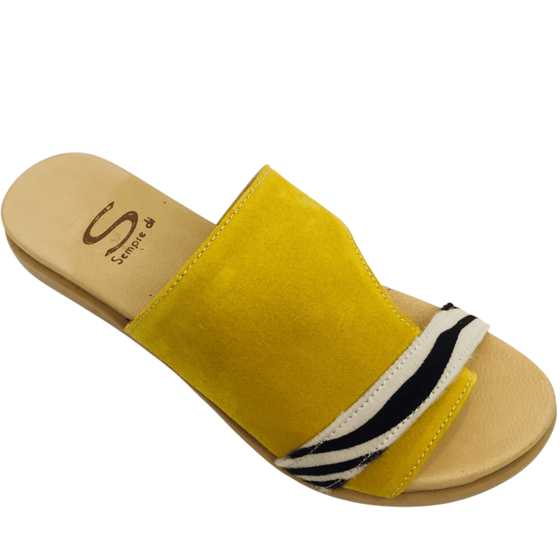 Comfortable foot bed, mustard suede with zebra pony hair strap across the toes and a toe piece thong.