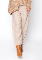 linen pants with drawstring at the waist and ankles. made in Italy, colour natural