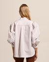 A precise and defined piece, the Oblige shirt aspires to new heights. Fresh and contemporary the seamed and top-stitched sleeve provides drama with beautiful detail. This detail is balanced by a clean concealed button placket and scooped hemline. Contrasting top-stitch seal the deal on this stunning wardrobe stable.    