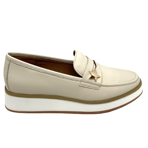 Here's a comfortable retro loafer that's going to be a hit in your winter wardrobe. The white rubber and tan trimmed platform looks great and adds some height. The star trim on the tab cross the foot adds to their appeal.  Colours - Camel, Cream