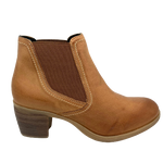 This classic elastic sided rubbed leather ankle boot is not only hard wearing but will serve you well for so many occasions.  It has a stacked  6cm mid heel with extra padding and a rubber sole for comfort that will have you smiling all day long.  Stitching detail and the perfect shade of tan finishes these versatile boots off beautifully.  Made by Zeta in Spain.