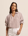 The Stroll channels a slight 70’s vibe with its splayed collar that moves into a flattering v neckline. Push up the sleeves for a laid-back aesthetic or keep them down for a smarter work-ready look. Crisp and fresh, this piece is great worn over denim or your favourite pant and is sure to become a hardworking favourite in your trans-seasonal wardrobe.   