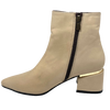 A sleek ankle boot that has a slightly retro vibe.  A pointed toe with an inside zipper, it is simple and stylish. A 6 cm block heel has metal detail to elevate the look.  Wear with your favourite short skirt, pants or even a midi.  Thyme & Co  Made in Turkey