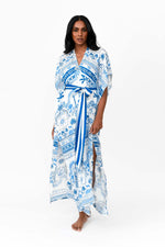 Made by Possi in soft 100% viscose this glamorous long kimono is the perfect holiday piece. Wear over swimmers or dress up for lunch or a casual dinner. The Mediterranean print in blue has a waist tie of blue and white stripe.  Available in long or short length.  Sizes  -  S/M  L/XL