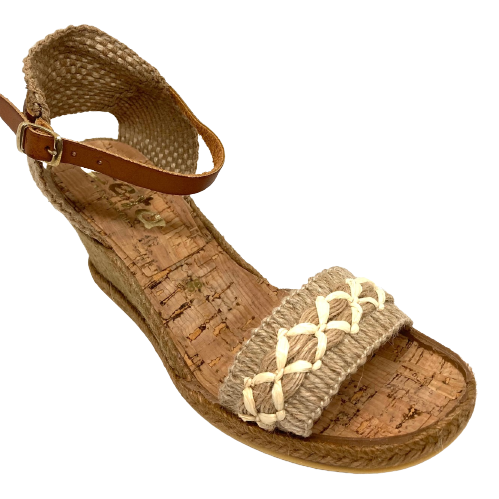 This unique little Spanish espadrille is made from a great combination of jute, string and hessian with an interesting crisscross pattern of stitching across the toes. The hessian heel cup is finished with a tan leather ankle strap. The natural fibres make it the perfect wedge for your summer linens and cottons. Heel height is 6cm with a 1cm platform (5 tier).