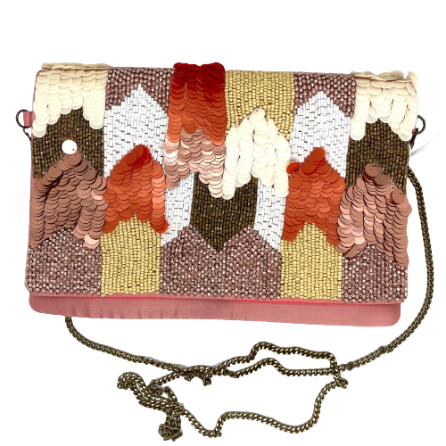 Make a splash with this beaded clutch (crossbody) bag beaded in colours of bronze, rust, cream, orange and blush. The back is blush satin and the chain means you'll be hands free at your next big event.