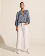 The Rhythm lends a cool and relaxed edge to spring dressing. With a wide, slightly cropped leg and a high waistline this pant feels fresh and contemporary. Wear yours with your favourite feminine tops for an elevated aesthetic. Wide cropped leg, high waisted with zip and button closures, lightly elasticated for comfort and fit.  Zoe Kratzmann