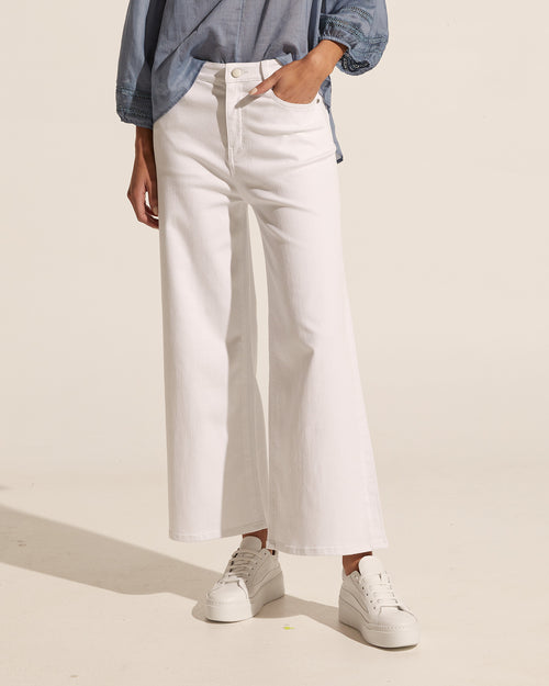 The Rhythm lends a cool and relaxed edge to spring dressing. With a wide, slightly cropped leg and a high waistline this pant feels fresh and contemporary. Wear yours with your favourite feminine tops for an elevated aesthetic. Wide cropped leg, high waisted with zip and button closures, lightly elasticated for comfort and fit.  Zoe Kratzmann